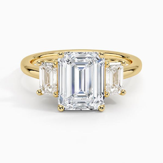 Three Stone Lab-Grown Diamond Complete Engagement Ring in 14 Karat Yellow with 1 Emerald Lab Grown Diamond, Color: G, Clarity: VS1, totaling 3.14ctw